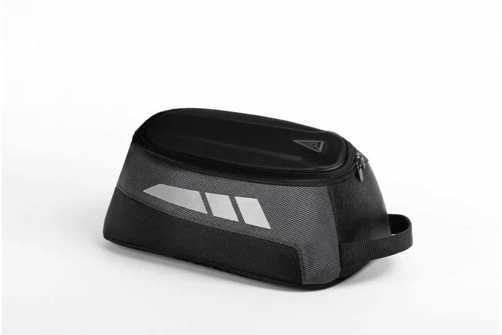 Black Motowolf Magnetic Tank Bag mounted on the steel fuel tank of a motorcycle