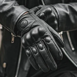Index finger of the Motowolf Full Finger Goatskin Leather Gloves operating a smartphone navigation screen