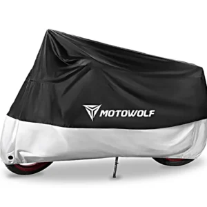 Black and silver Motowolf Waterproof Motorcycle Cover draped completely over a parked motorcycle outdoors