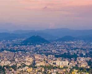https://tripxl.com/blog/wp-content/uploads/2024/08/View-from-Nilachal-Hill.jpg