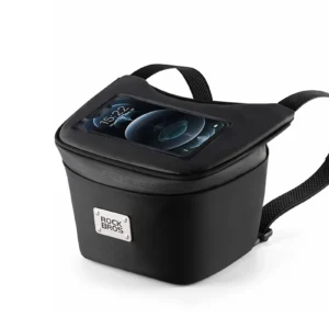 Black Rockbros Lunch Carry Bag standing upright on an outdoor table beside a motorcycle