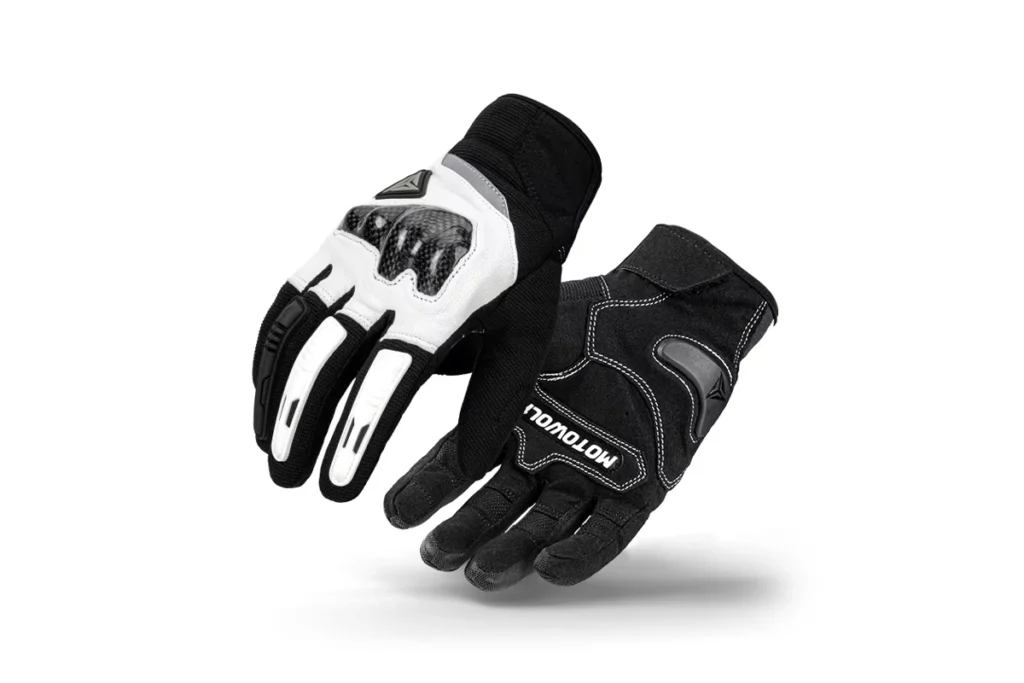 Motowolf Leather Gloves – Premium Motocross Riding Gear 1 Pair of black Motowolf High Quality Leather Full Finger Gloves resting on a motorcycle seat