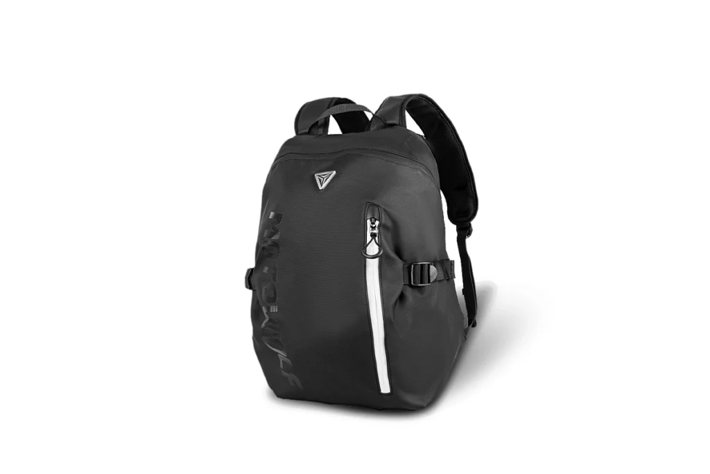 Black Motowolf MB18 Motorcycle Backpack resting on the passenger seat of an adventure motorcycle