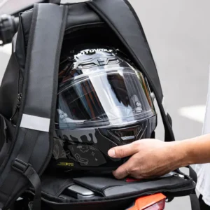 Water droplets beading off the abrasion-resistant fabric of the Motowolf MB18 Backpack