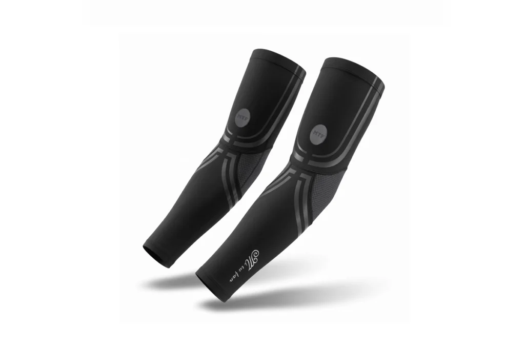 Pair of black Flame Hand Sleeves displayed against a bright summer outdoor background