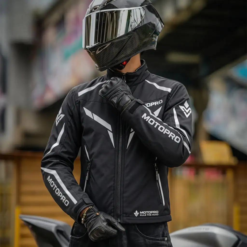 MotoPro Windbreaker – Iridescent Reflective Motorcycle Windbreaker 6 Front and back view of the MotoPro Windbreaker under standard daylight conditions showing sleek geometric white panels