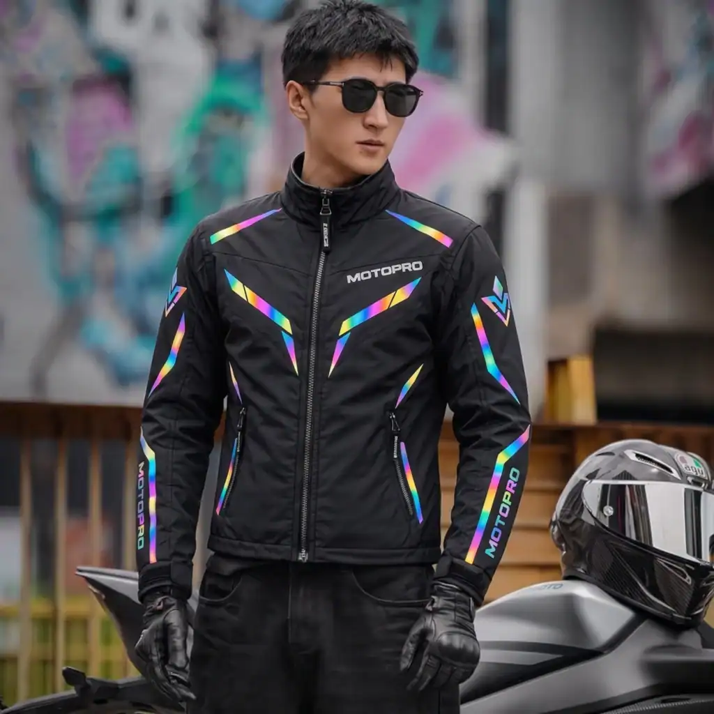 MotoPro Windbreaker – Iridescent Reflective Motorcycle Windbreaker 5 Motorcyclist wearing the MotoPro Windbreaker at night in the city with the reflective panels glowing brightly