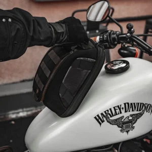 Open view of the Motowolf Retro Magnetic Tank Bag MB11 showing a smartphone, wallet, and keys stored safely inside